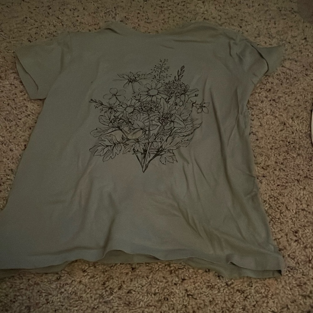 Green shirt with flower bouquet